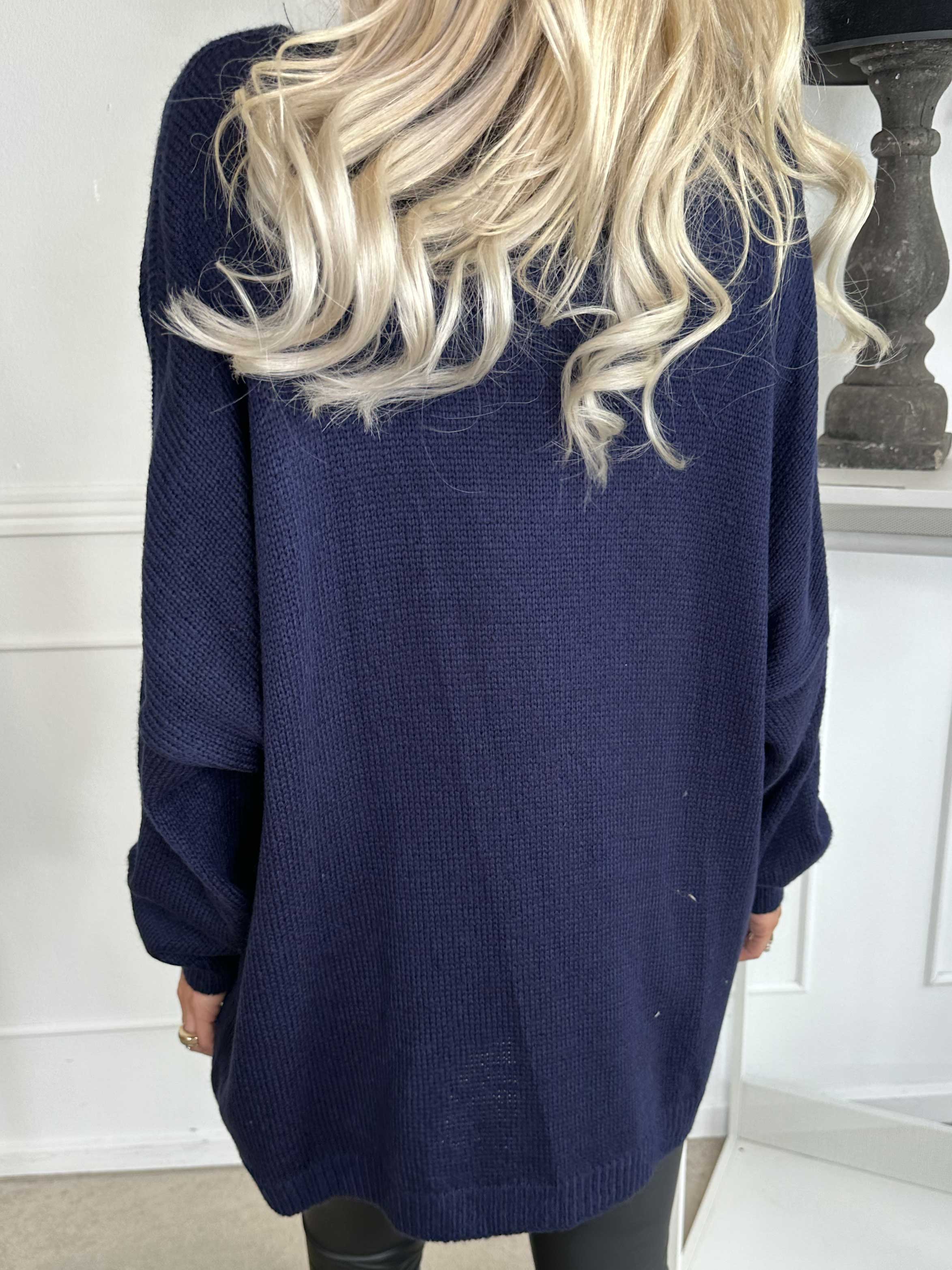 Omaria - Strikbluse med fyrværkeri på